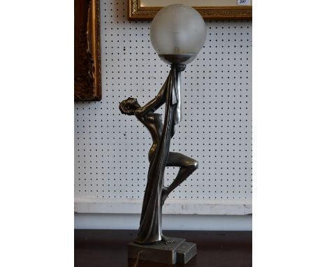 A large silvered Art Deco style lamp, as a dancing lady