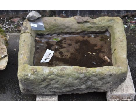 A 19th century Derbyshire gritstone trough, 21cm high, 60cm long, 52cm wide 