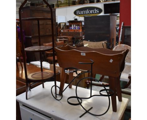 A novelty wrought iron planter as a penny farthing bicycle; a mahogany plant trough; an Edwardian three tier cake stand (3)
