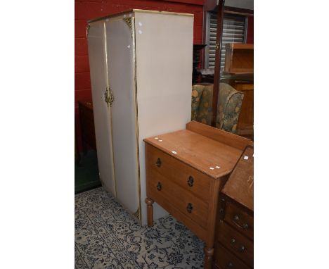 An oak three drawer dressing chest, circa 1930; an oak two drawer chest, circa 1930; a DS Furniture gentleman's wardrobe, cir