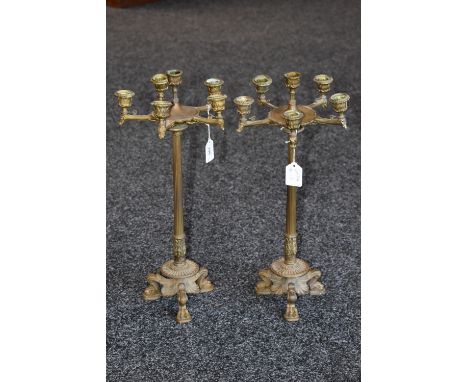 A pair of 19th century Grecian Revival 'Grand Tour' six light tall table candleabra, lotus cast sconces, acanthus fluted colu