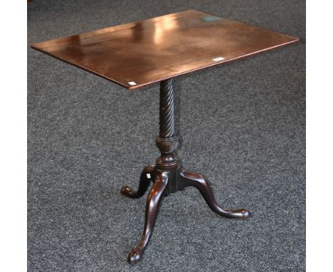 A George III mahogany tilt top tripod table, rounded rectangular top, baluster spirally fluted column, cabriole legs, pad fee