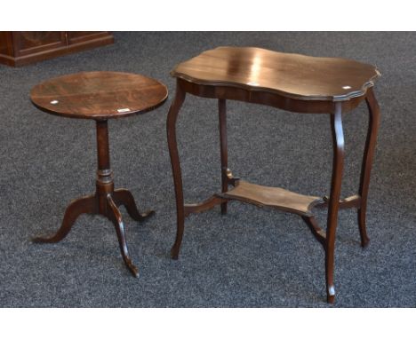 An Edwardian mahogany shaped rectangular occasional table, c.1905; a 19th century oak circular tripod occasional table (2)