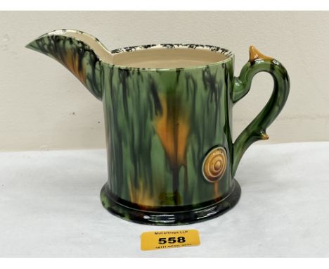 * WALTER KEELER. BRITISH Bn. 1942. A jug in Whieldon ware green and yellow glazes. Artist's mark. 5" high.