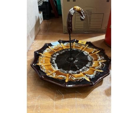 An unusual umbrella form ceramic cake stand.
