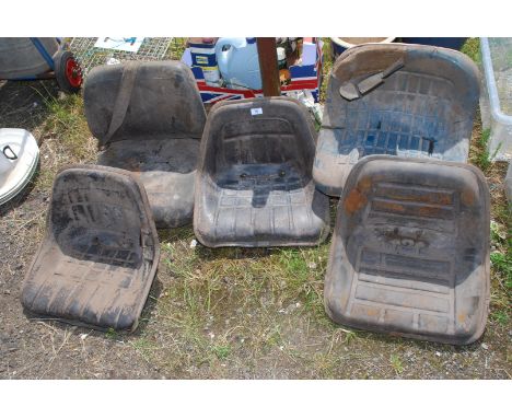 Five various tractor Seats.