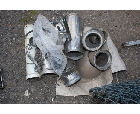 A quantity of stainless steel 5'' flue pipe collars and various connectors.