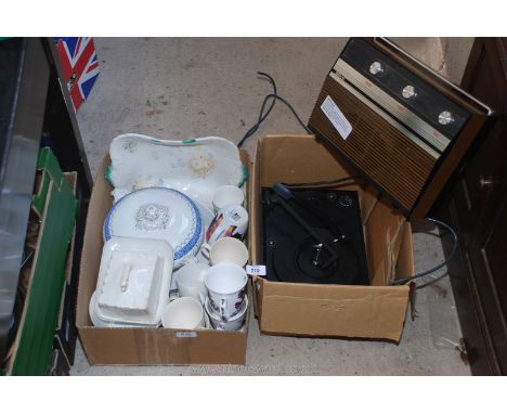 A box of miscellaneous china and mugs plus a mini record player.