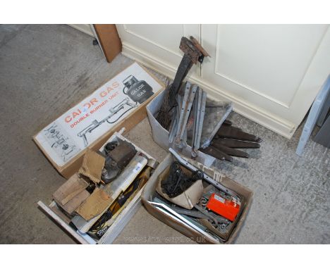 A box of various shelf brackets, twin gas burner, gate hinges, window furniture etc.