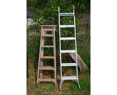 A convertible step ladder and five rung wooden steps.