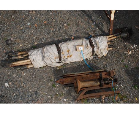 A set of cane drainage rods, foot pump, gate hinges, jack, etc.