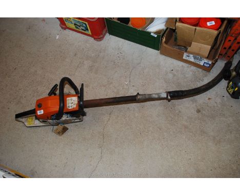A petrol Chainsaw MT9999 with extended exhaust