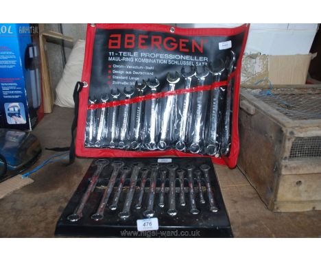 A roll of imperial open ended and ring spanners plus a case of metric open ended and ring spanners.