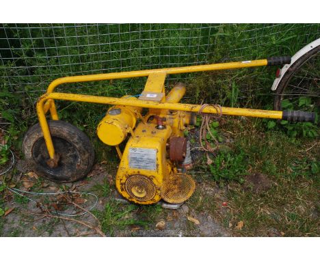 A petrol water pump on trolley (engine seized).