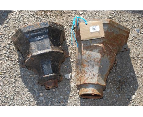 A corner cast iron rainwater hopper plus another.