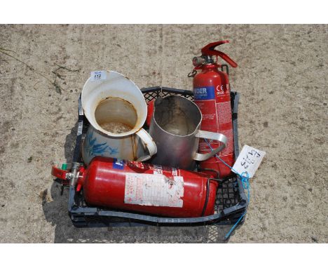 A hand fire extinguisher and enamel jugs.
