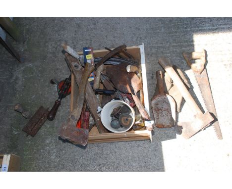 A quantity of hand tools including axes etc.