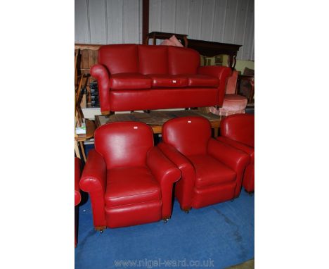 A three seater leather style red sofa and two chairs.