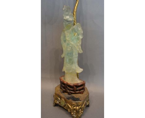 A Chinese Jade Figure Mounted on a Table Lamp, the figure 23cm tall 