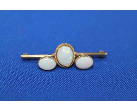 OPAL BAR BROOCH AND EARRINGS
the brooch set with a single oval cabochon opal, in 9ct gold; the earrings each set with an oval