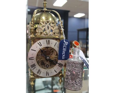 VICTORIAN-STYLE BRASS LANTERN CLOCK
together with a Staffordshire figure (damaged) and an Edwardian bottle contained within a