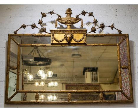 WALL MIRROR, 105cm W H x 130xm W, George III giltwood and gesso, circa 1800, with urn, leaf and rams head surmount. 