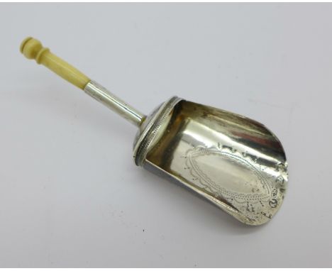 A 19th Century silver shovel caddy spoon, Birmingham 1804