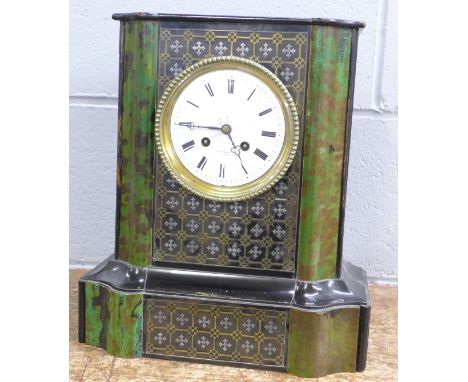 A Henry Marc Paris ebonised and marbled effect striking mantel clock with keys, 32.75cm