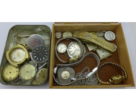 A collection of watch parts, two Timex wristwatches and a pendant watch