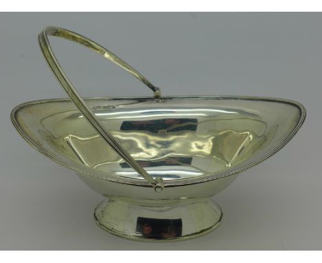 A silver navette shaped sugar basin with handle, 174g