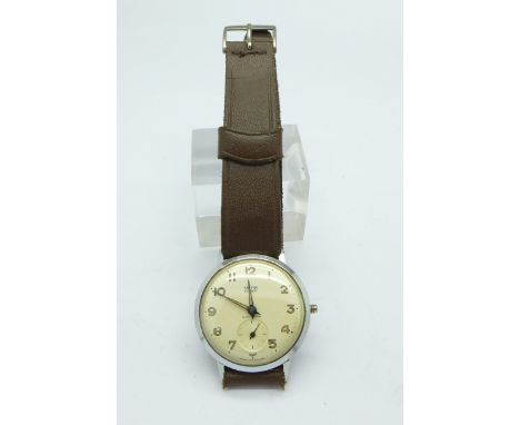 A Smiths Everest manual wind wristwatch, lacking winding crown, with inscription dated 1965