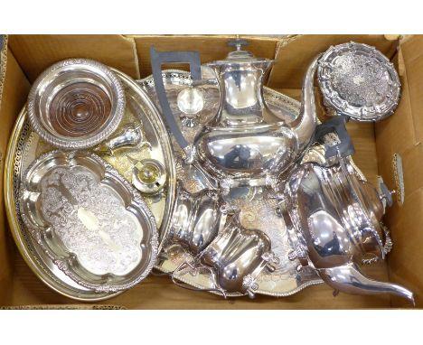 A Viners silver plated four piece tea service, two plated trays, wine coaster, etc.