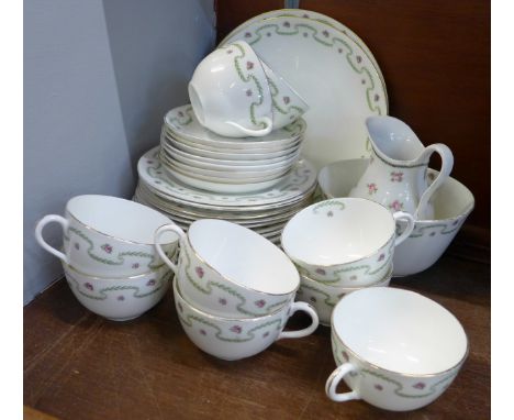 A thirty-three piece Hammersley china tea service, milk jug a/f