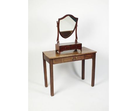 A George III mahogany side table the rectangular top above a cockbeaded central frieze drawer and raised on grooved square le