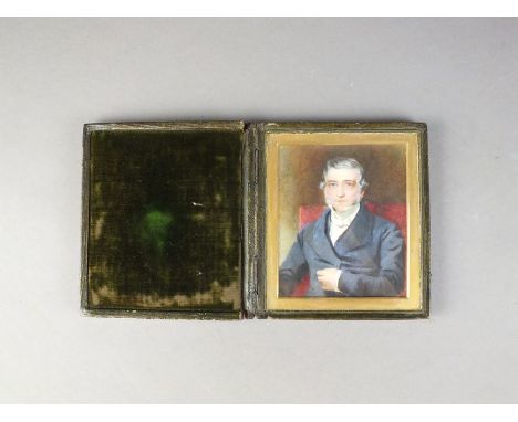 British School, 19th century, portrait miniature of a gentleman, half length wearing a blue jacket, white stock and waistcoat