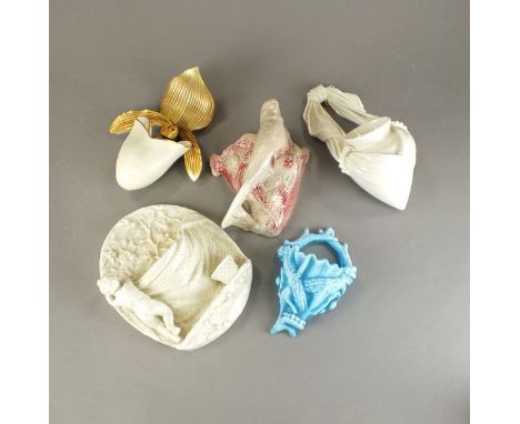 A collection of Victorian and later wall-pockets, including an example in the form of a bull's head, a delft cornucopia, pock