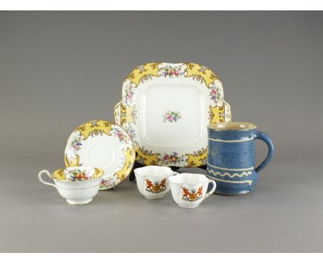 An Aynsley yellow ground tea service decorated with fruit, retailed by Mortlocks Ltd, London, a pair of Shelley crested cups 