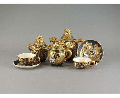 A Japanese satsuma style tea setTaisho periodThe hollow wares with dragon handles and finials, richly picked out in gilt, dec