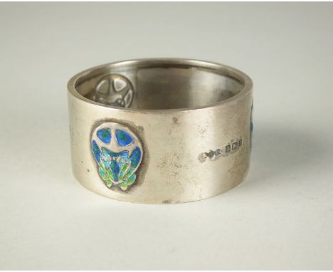 A Liberty & Co Cymric style silver and enamel napkin ring, engraved 'EMME', weight 27g