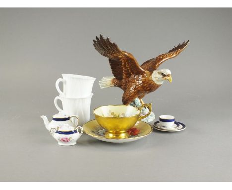 A Beswick model of a bald eagle, shape 1018, a Shelley plain white part tea service, a miniature Coalport teapot and cover wi