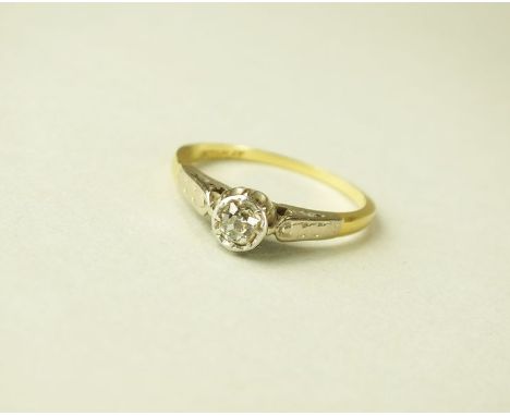 A single stone diamond ring, the old cut diamond illusion set in white metal to yellow metal shank stamped '18ct plat', weigh