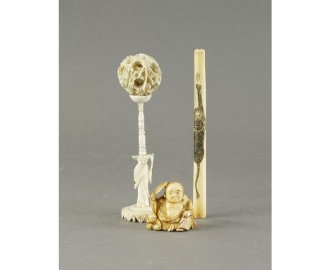 A Japanese marine ivory netsuke of a BuddhaMeiji periodModelled seated and holding a fan with a small boy seated beside him, 