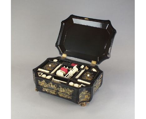 A Chinese export lacquer sewing box19th CenturyOf lobed rectangular form raised on four claw feet, decorated in gilt with a b