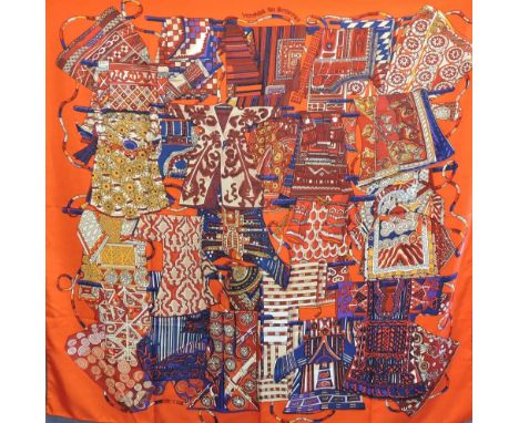 Hermes, Paris, silk scarf, Voyage en Etoffes, geometric pattern in oranges, blues and golds. 130cm x 130cm.