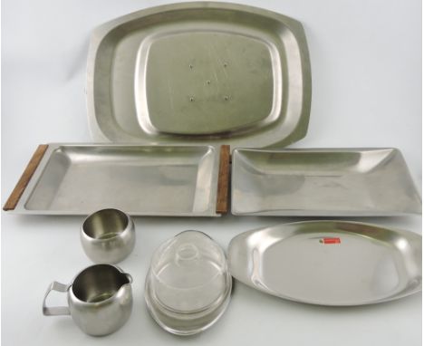 A collection of stainless steel serving items including a large Old Hall ashette, together with an Old Hall milk jug and sucr