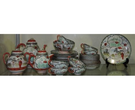 An early 20th century Japanese eggshell wear tea service, decorated in a traditional manner.