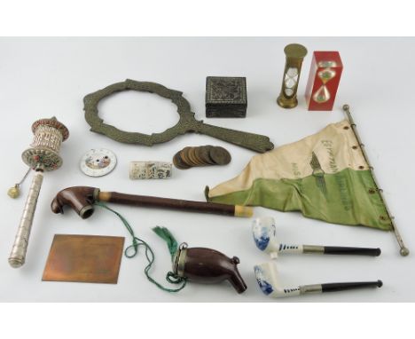 A collection of assorted Victorian and later objects and collectables including an enamel pocket watch face, an engraved bras