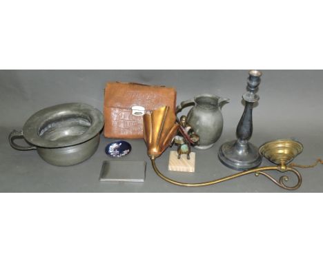 A quantity of metalware including a lamp after Benson with a copper shade, three table lighters, pewter chamber pot and a pai