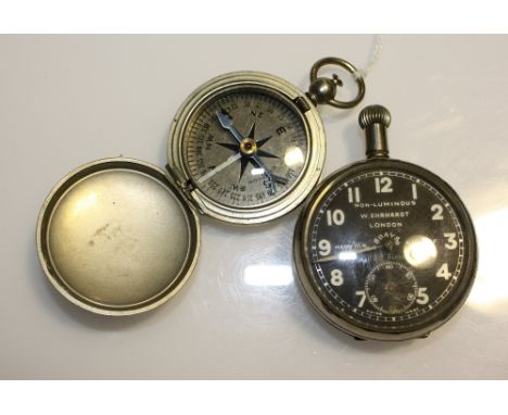 An early 20th Century RAF issue stainless steel pocketwatch the eight day movement with black dial marked Ehrhardt London, ma