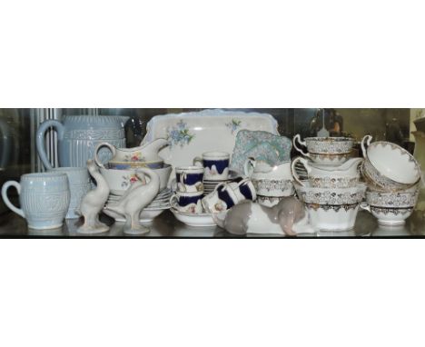 A Lladro Cinderella figure, together with a Lladro model of a puppy and two geese, and a small quantity of ceramics and teawa